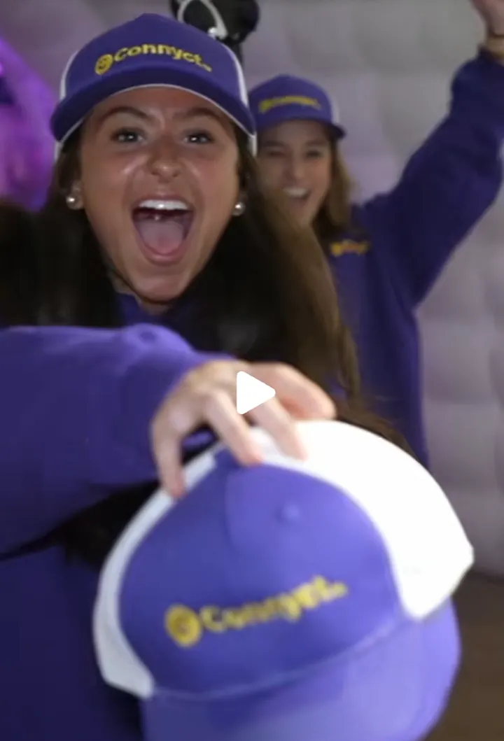 Connyct campus ambassadors celebrating in branded hats